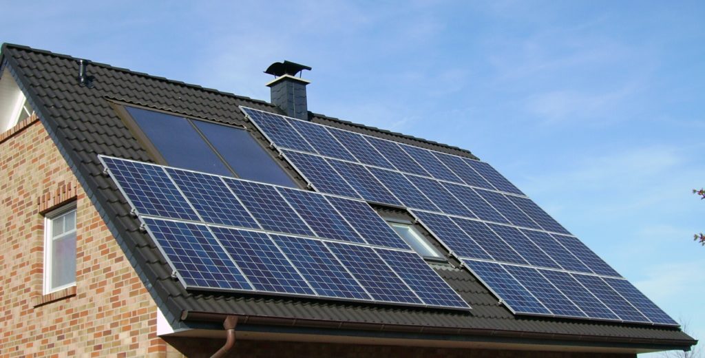 An array of solar panels installed on a roof